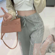 画像をギャラリービューアに読み込む, 女性のファッション ハイウエスト レース カジュアル パンツサイドにレースのデザインが切り替えになったレディライクなフレアパンツ