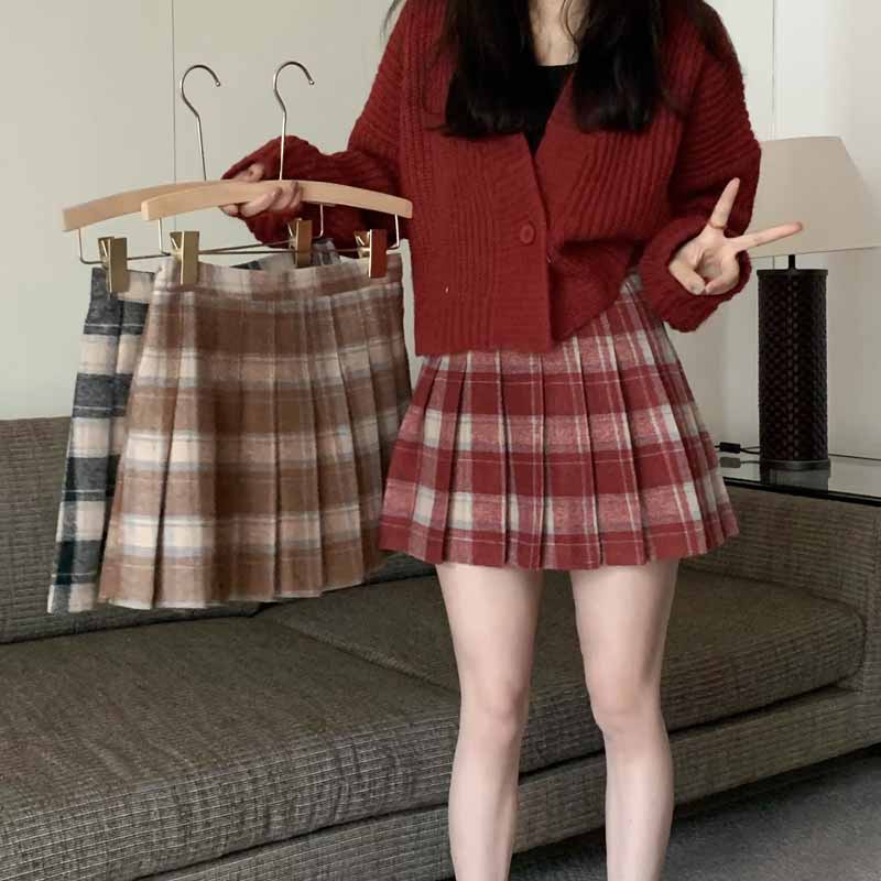 レトロなチェック半身スカート婦人服新型ハイウエスト着痩せデザイン感A字プリーツスカートins