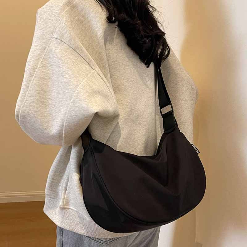 学生カジュアルナイロンリュック女性新型潮韓版ギョーザバッグ100枚入り大容量斜めショルダーバッグ